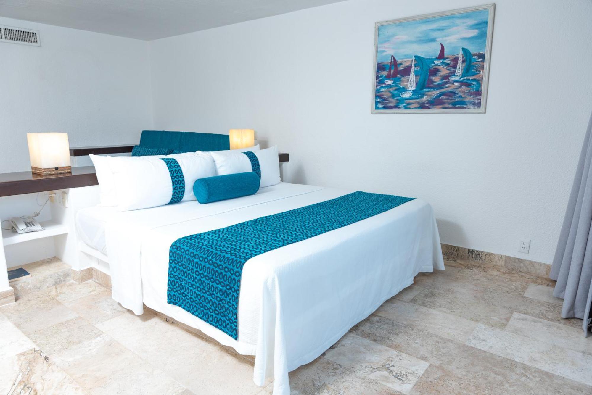 Ritz Acapulco All Inclusive Buitenkant foto A bedroom at the hotel